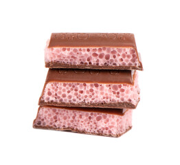 Porous chocolate pieces isolated on white background. Pink strawberry aerated chocolate.