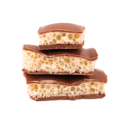 Tasty porous chocolate, isolated on white background. White aerated chocolate.