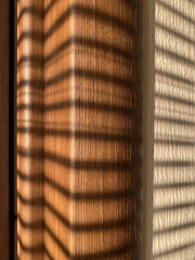 stripes shadow on wall in sunny day