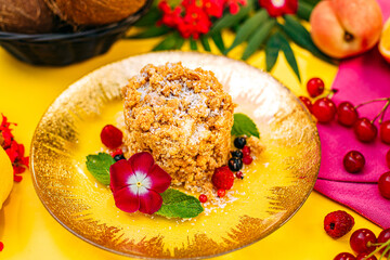 dessert. Cake with berries and mint on a decorated table