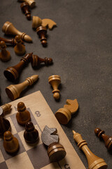 Chess pieces border on dark background