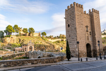 Alcantara Bridge with Castillo San Servando castle in Background - obrazy, fototapety, plakaty