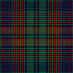 Tartan plaid pattern in red, green, blue. Seamless multicolored textured check plaid graphic for Christmas and New Year modern interior design or autumn winter fashion print.