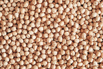 Dry chickpeas as a background texture. Top view. Copy, empty space for text