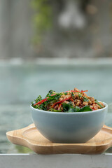 Stir fried minced pork with basil leaves on  thai jasmin rice , thai street food