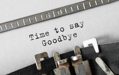 Text Time to Say Goodbye typed on retro typewriter