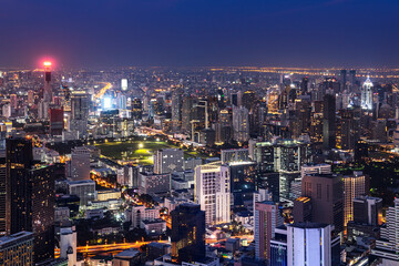 Fototapeta na wymiar cityscape of Bangkok city skyline with sunset sky background, Bangkok city is modern metropolis of Thailand and favorite of tourists