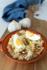 Atascaburras, typical dish of Castilian La Mancha gastronomy: potato, cod, egg and walnuts
