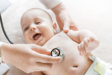 doctor listen small child with stethoscope.
