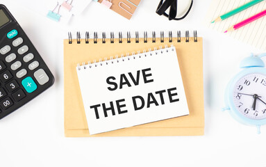 Text Save the date on white paper on the laptop computer business concept