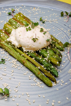grilled asparagus with a soft poached egg