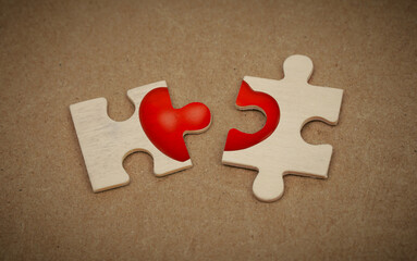 Two pieces of a puzzle with heart.Puzzles two halves of one whole, man and woman love Valentine's Day greeting card.