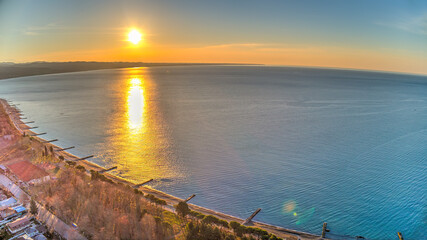 Dawn over the black sea. resort town Sukhum, Abkhazia aerial. Beach