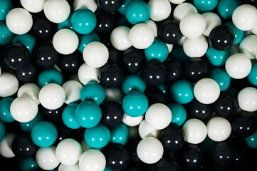 Top view of colorful dry pool balls one on another