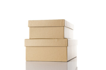 Mockup box paper. Brown cardboard carton package for shipping delivery isolated on white background. Closed craft paper object mockup for design.