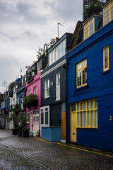 Colorful English houses facades in London on a cloudy day