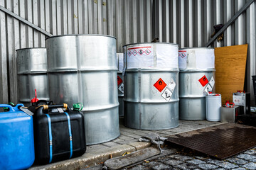 Big metal barrels containing hazardous chemicals from laboratories, business and industry...