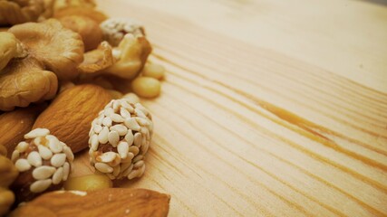 Organic mixed nuts as background. Natural background made from different kinds of nuts. Nuts close up.