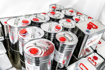 Metal tin containers for storing chemicals, chemistry background, industry waste management