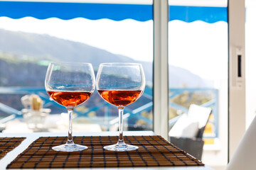 A glass of wine sitting on top of a table