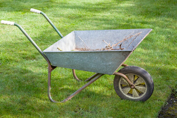 Wheelbarrow in a garden, UK