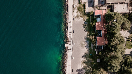 Aerial view of group of people riding bicycles in Kotor bay (Boka Kotorska), Montenegro, Europe