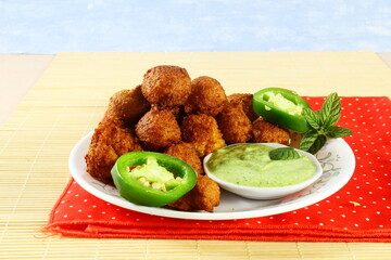 traditional homemade indian gujarati tea time snack khata vada or jowar vada with chutney