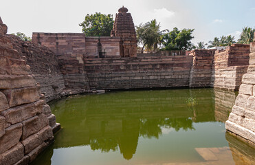 Aihole, Karnataka, India - November 7, 2013: Chakra Gudi temple. Brown stone Vimanam tower on top...