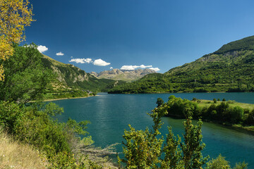 Naklejka na ściany i meble view of the Lanuza reservoir located in the Aragonese Pyrenees in the province of Huesca, Spain