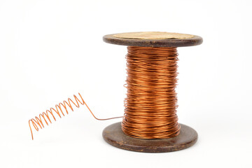 Coil with copper wire, the end of which is twisted into a spiral, isolated on white background