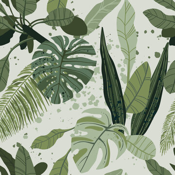 Seamless tropical pattern with exotic palm leaves and various plants on light background.
