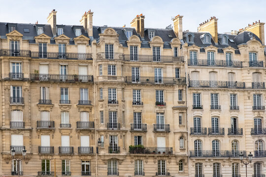 Paris, narrow building boulevard Parmentier, typical parisian facade
