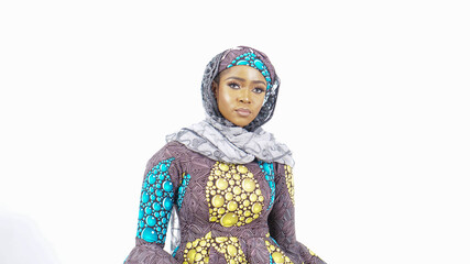 Portrait of pretty African woman from Northern Nigeria wearing traditional dress