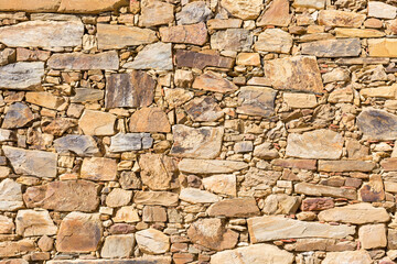 background of an ancient wall made of stones