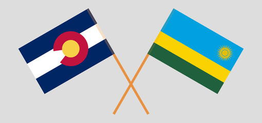 Crossed flags of The State of Colorado and Rwanda