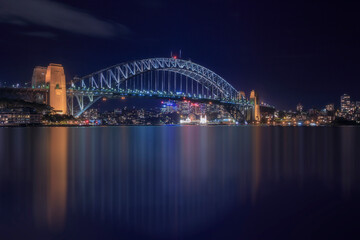 Fototapeta na wymiar Night scene cityscape of Sydney skyline with illuninated building and bridge at Sydney, Australia