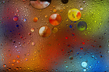 Abstract colorful bubbles. Freeze motion of color dust particles splash. Background image.