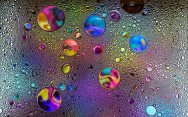 Abstract colorful bubbles. Freeze motion of color dust particles splash. Background image.