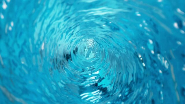Super slow motion of rotating water in twister shape with zoom camera movement. Filmed on high speed cinema camera, 1000 fps.