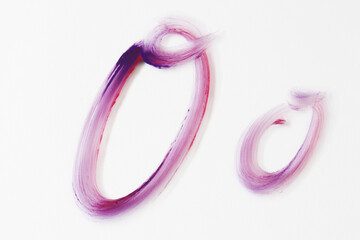 letter "o" in red and purple watercolours