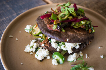 Gordita made with blue corn masa stuffed with chicharron, short rib, and cheese at a restaurant in Mexico City