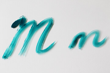 brush painted turquoise watercolour letter 