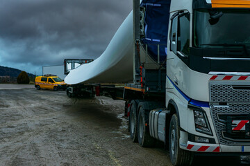 Truck for special transport loaded with a wind turbine blade.