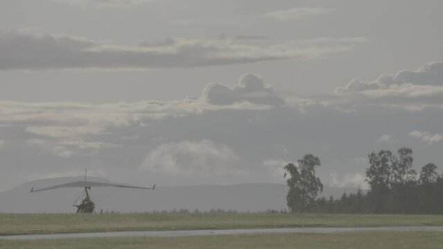 Microlight preparing for take off and in flight