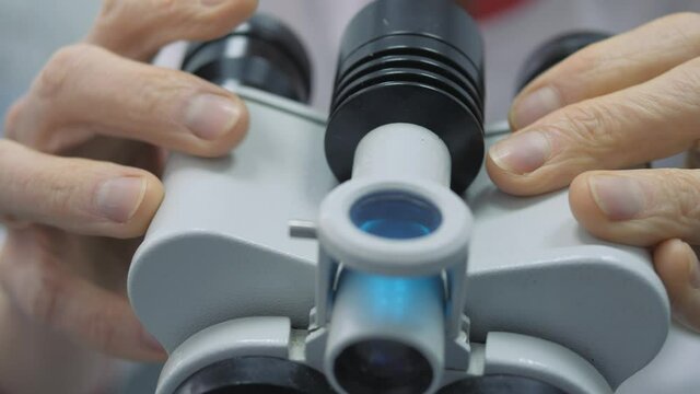 Obstetrician and gynecologist. Examination under a colposcope.