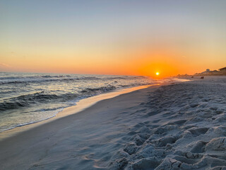 Sunset on the white sands of Navarre Beach, FL