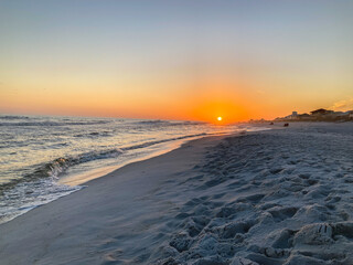 Sunset on the white sands of Navarre Beach, FL