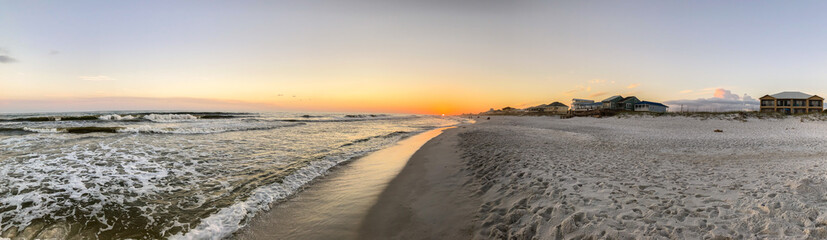 Sunset on the white sands of Navarre Beach, FL