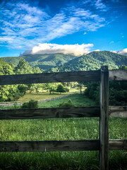 Fototapeta na wymiar Clouds and broken blue sky over the Balds in Roan Mountain. Tennessee, North Carolina.