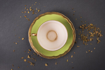 green tea cup on a gray background